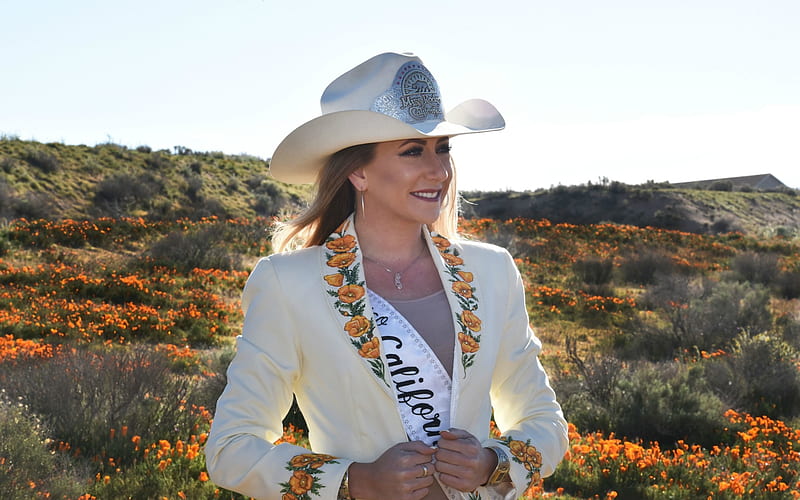 Miss Rodeo ~ California, brunette, hills, cowgirl, wildflowers, flowers, sash, hat, HD wallpaper