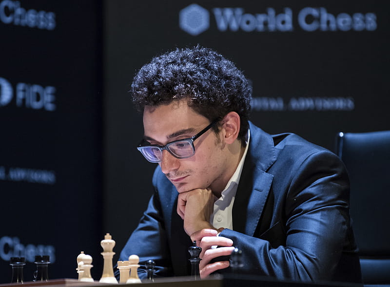 Clash of chess stars ends in dramatic draw after seven gruelling