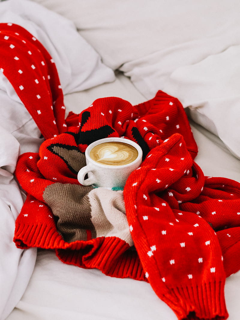 round white ceramic mug with coffee beverage inside on top of red and white polka dot knitted sweater, HD phone wallpaper