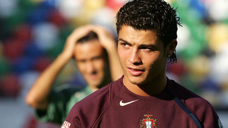 Young Cristiano Ronaldo Is Wearing Dark Maroon Sports Dress Standing In Colorful Blur Background Ronaldo, HD wallpaper