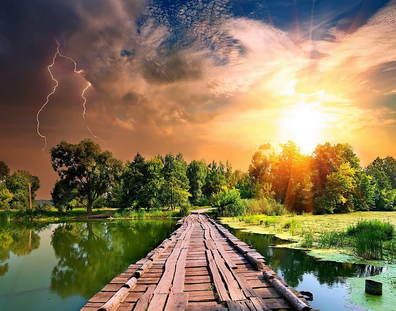 Lightning And Sun, wooden bridge, grass, yellow, bonito, trees, sky, clouds, storm, pond, lagoon, green, rays, white, blue, HD wallpaper
