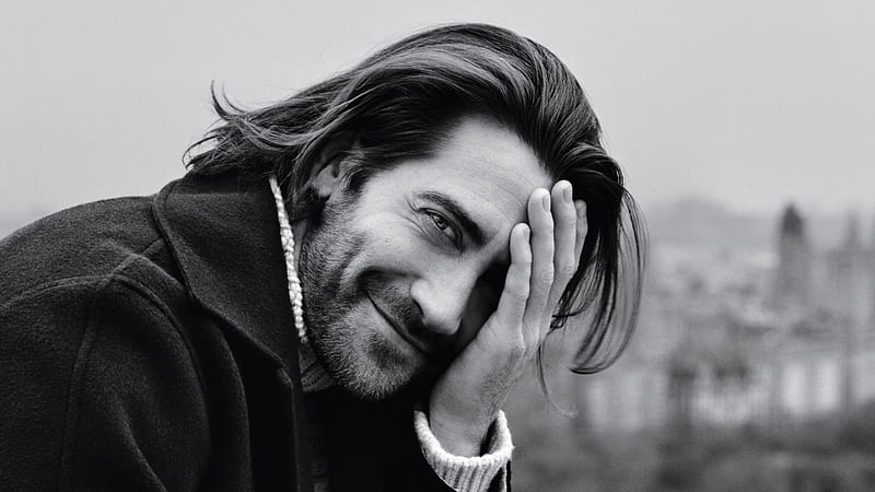 Smiley Jake Gyllenhaal Is Covering Eye With Hand Wearing Black Coat Celebrities, HD wallpaper
