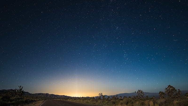 / the pavement in the center of desert area leads to glowing sunrise illuminating night sky, starry sky transition at nipton, HD wallpaper
