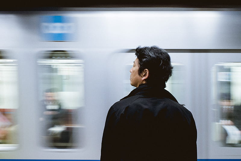 close-up graphy of man standing front of train, HD wallpaper