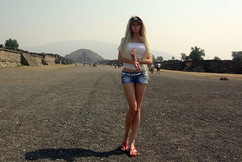 Valeria Lukyanova visits Meso - American Ruins, over the shoulder white blouse, denim shorts, white top, flip flops, blonde, white belt, mayan ruins, jewelry, HD wallpaper