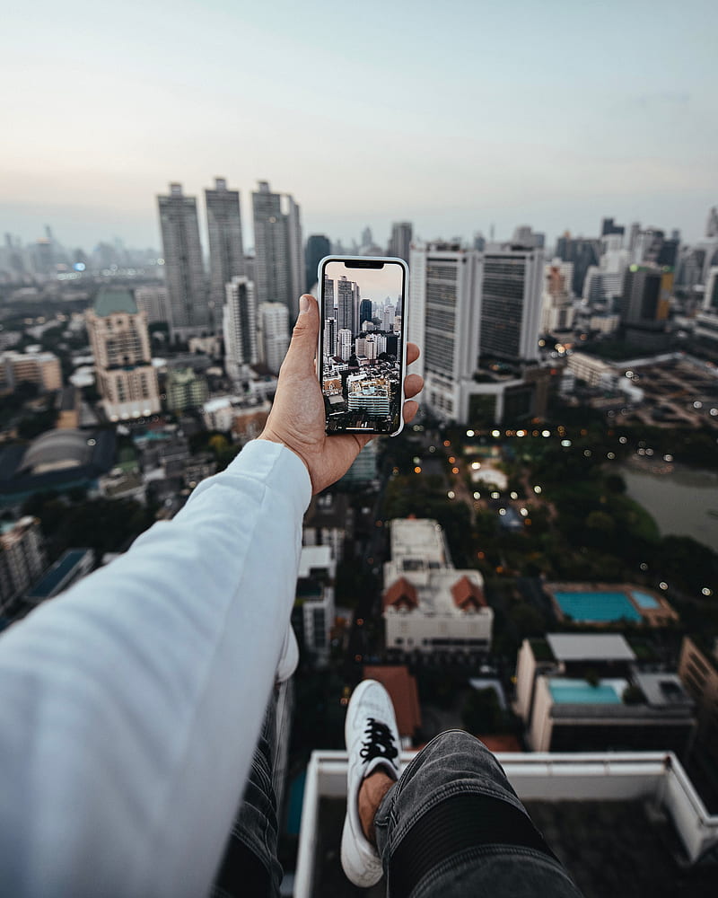 city, buildings, aerial view, hand, phone, overview, HD phone wallpaper