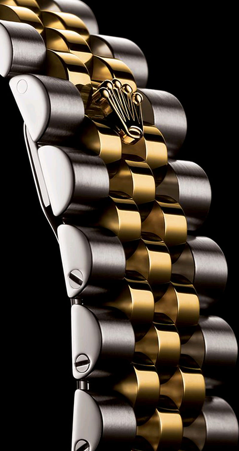 Vẻ đẹp của chiếc đồng hồ không chỉ nằm ở kiểu dáng mà còn cả màu sắc và phụ kiện tuyệt đẹp đi kèm. Kết hợp giữa đồng hồ và vương miện, đồng hồ sang trọng và bộ 2 màu vàng và bạc đem lại cho sản phẩm cuối cùng một vẻ đẹp độc đáo chưa từng thấy. 