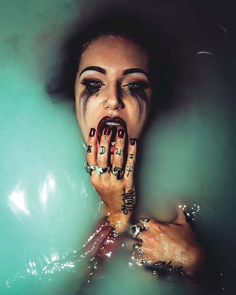 women, model, dark hair, brunette, in water, mascara, makeup, lipstick, red lipstick, dark lipstick, painted nails, red nails, rings, tattoo, jewelry, looking at viewer, vertical, water, touching face, open mouth, frontal view, smudged makeup, HD phone wallpaper