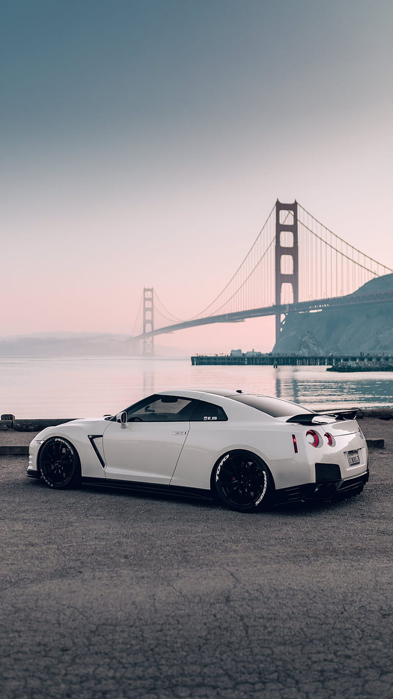 GTR with a view, nissan, white, car, supercar sports, america, sunset, bridge, HD phone wallpaper
