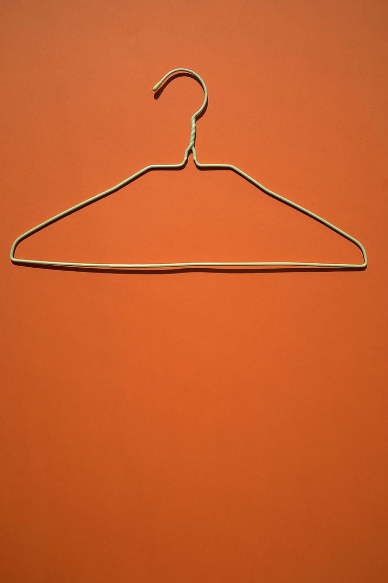 white clothes hanger on orange flooring, HD phone wallpaper