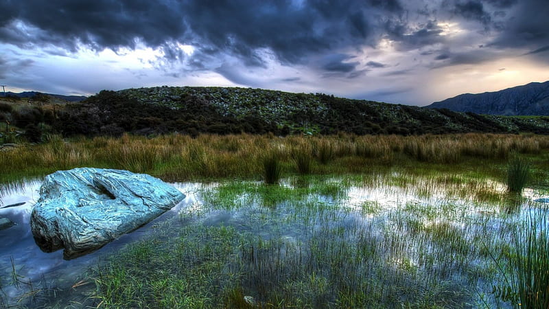 swamp under stormy sky, rock, grass, mountains, clouds, swamp, HD wallpaper
