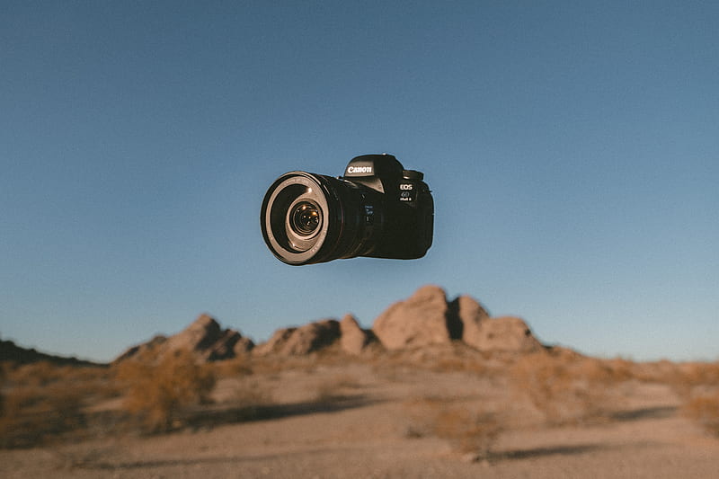 floating black Canon DSLR camera, HD wallpaper