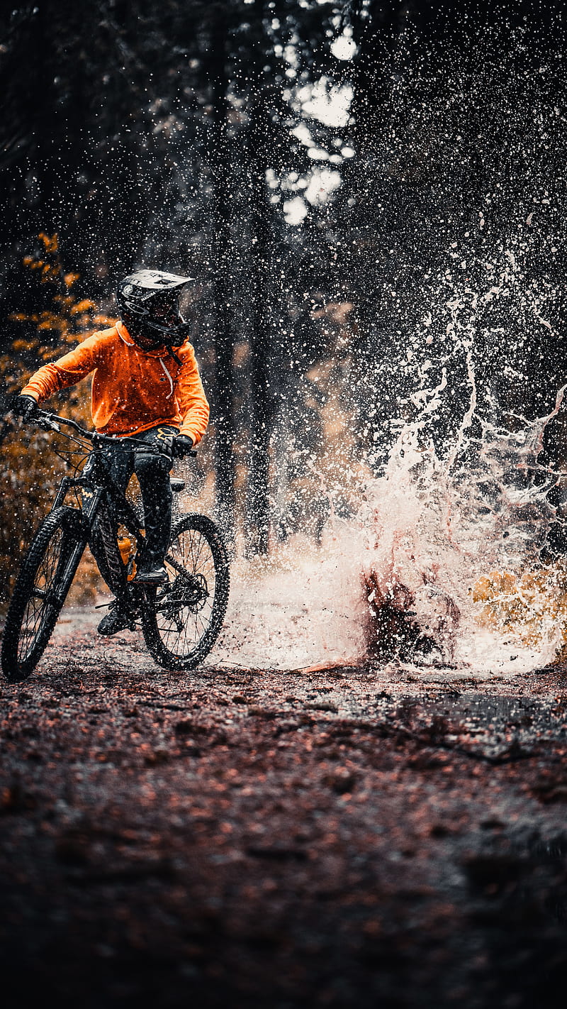 Cyclist, water splash, puddle, biking ...