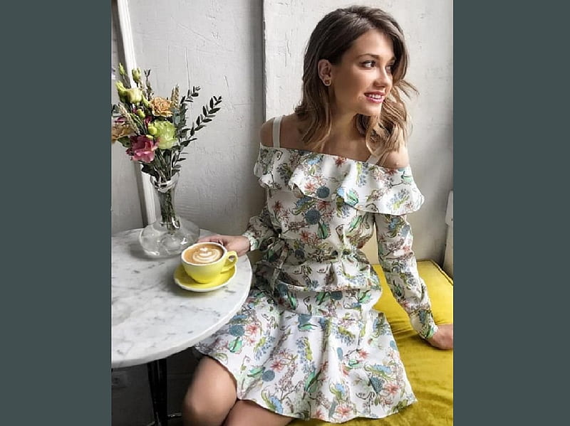 Brunette enjoying her morning coffee, brunette, ruffles, vase with flowers, flower pattern, earrings, small oval table, off shoulder dress, sitting, HD wallpaper