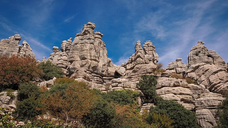 Layered rock towers in the Torcal de Antequera, Spain, clouds, sky, stones, rocks, plants, HD wallpaper
