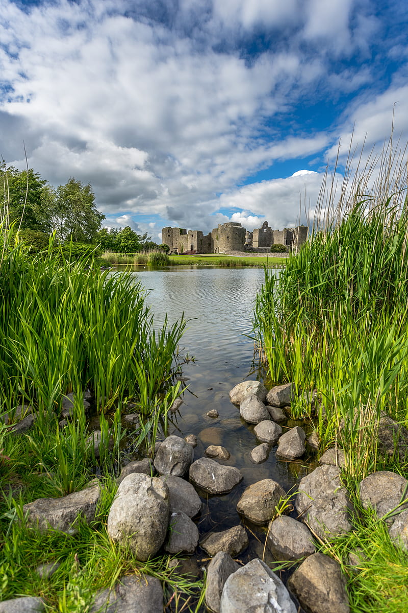 castle, lake, stones, grass, HD phone wallpaper
