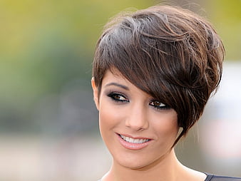 Frankie Sandford | Short asymmetrical haircut with one side in a bob and  the other clipped around the ear