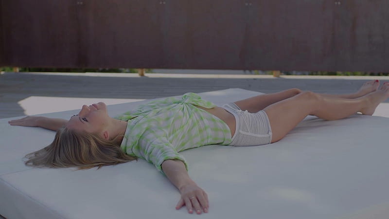 Anjelica Ebbi stretching out, mattress, white shorts, ash blonde, privacy fence, green plaid shirt, white, HD wallpaper
