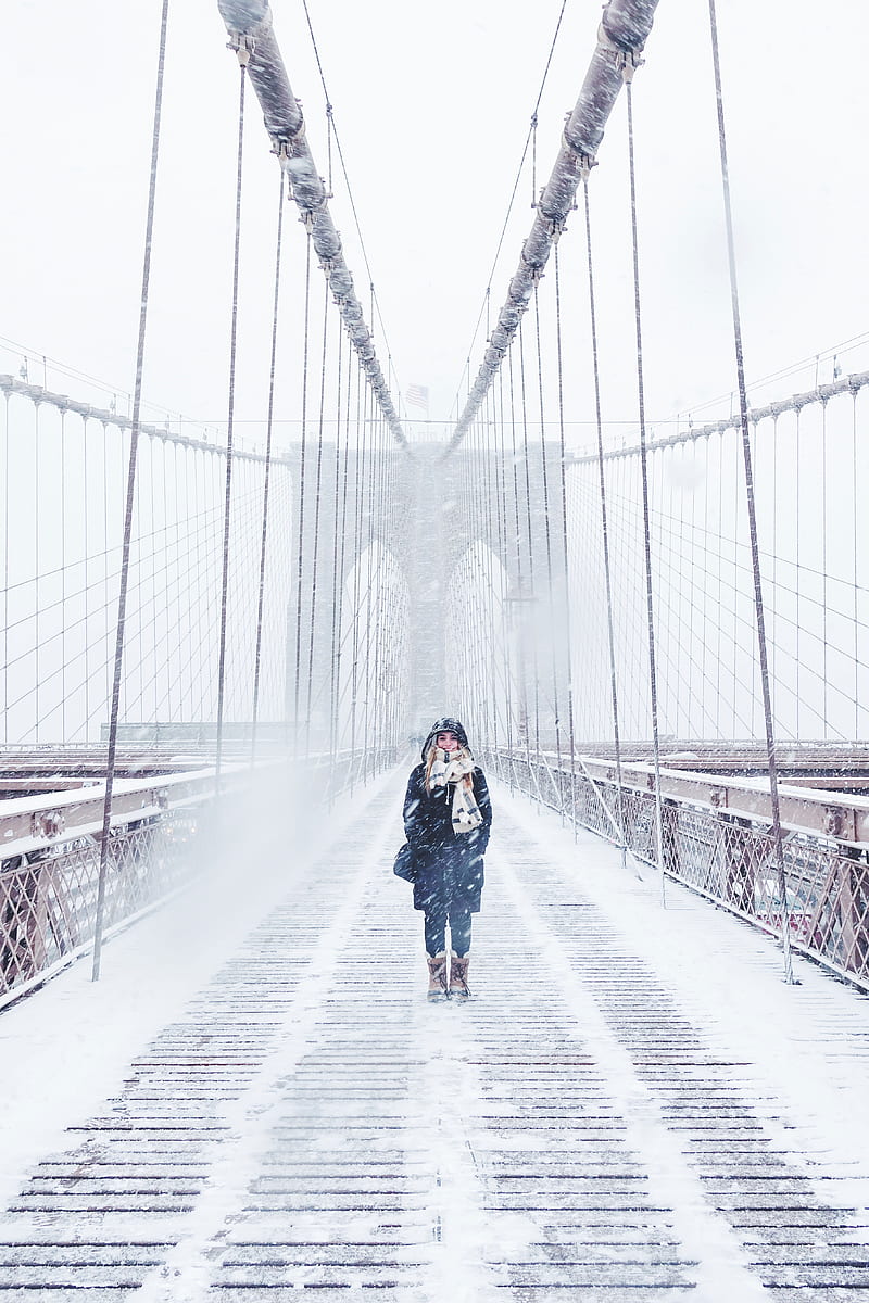 woman wearing black fur-lined coat standing on the bridge with snow during daytime graphy, HD phone wallpaper