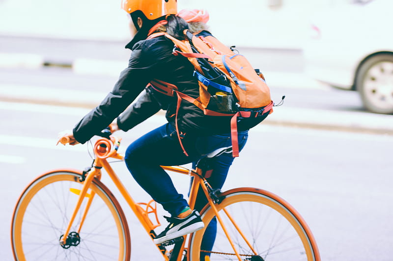 closeup of person riding a orange bicycle, HD wallpaper