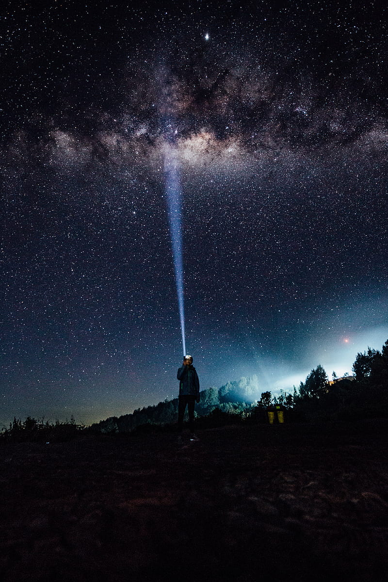 man, night, flashlight, light, ray, starry sky, HD phone wallpaper