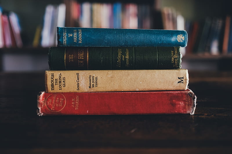four assorted reading books on brown surface, HD wallpaper
