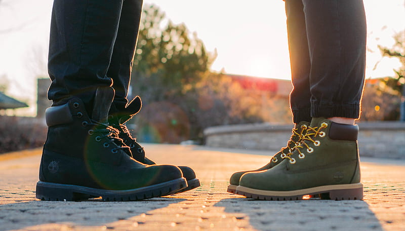 two people wearing green-and-black work boots standing on gray concrete pavement, HD wallpaper