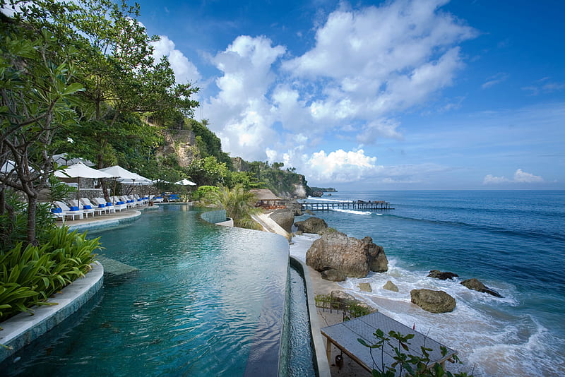 Tropical, umbrellas, sunchairs, rocks, ocean, pier, waves, sky, pool, lounges, blue, HD wallpaper