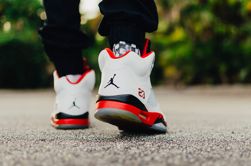 person wearing white, black, and red Air Jordan 5 shoes, HD wallpaper