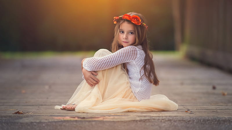 Cute Baby Girl Is Sitting On Road With Hands On Knees Wearing Sandal Skirt And White Netted Top Having Flower Crown On Head In Blur Background Cute, HD wallpaper