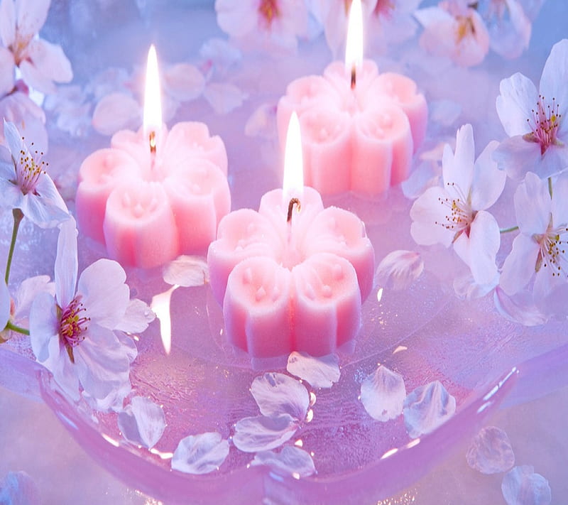 Beautiful candles with flowers on wooden background Stock Photo by  ©belchonock 62481207