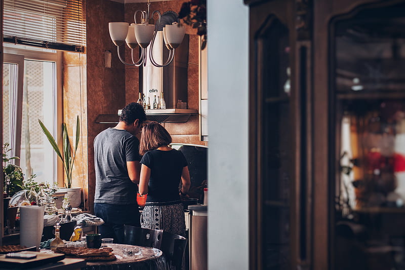 man and woman standing in front of gas range, HD wallpaper