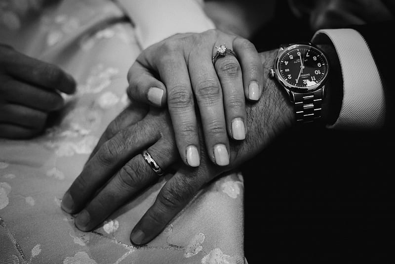 Couple holding hands grayscale romantic