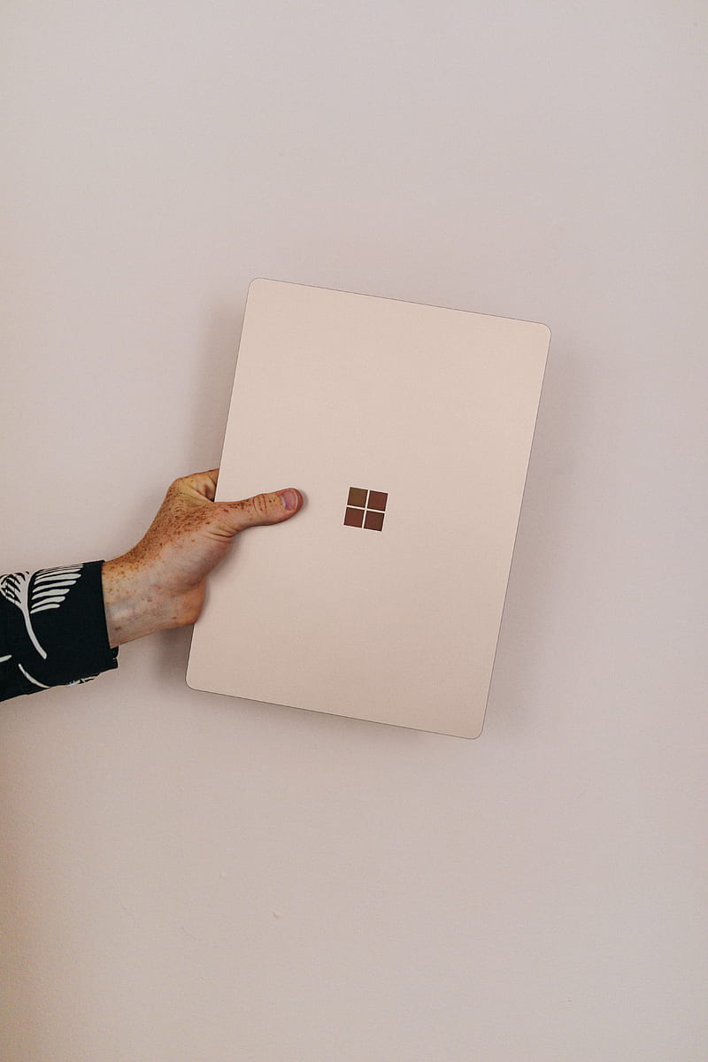 person holding sandstone microsoft Surface laptop laptop, HD phone wallpaper