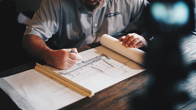 An architect working on a draft with a pencil and ruler, HD wallpaper