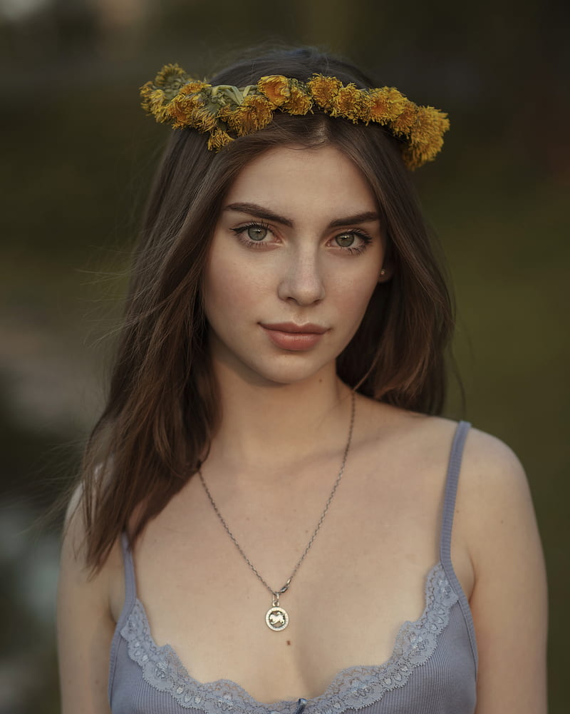 women outdoors, brunette, looking at viewer, face, necklace, bare shoulders, green eyes, depth of field, portrait display, flowers, pink lipstick, bokeh, graphy, blurred, tank top, David Dubnitskiy, Irina Sivalnaya, flower crown, closed mouth, portrait, grey tops, cleavage, HD phone wallpaper