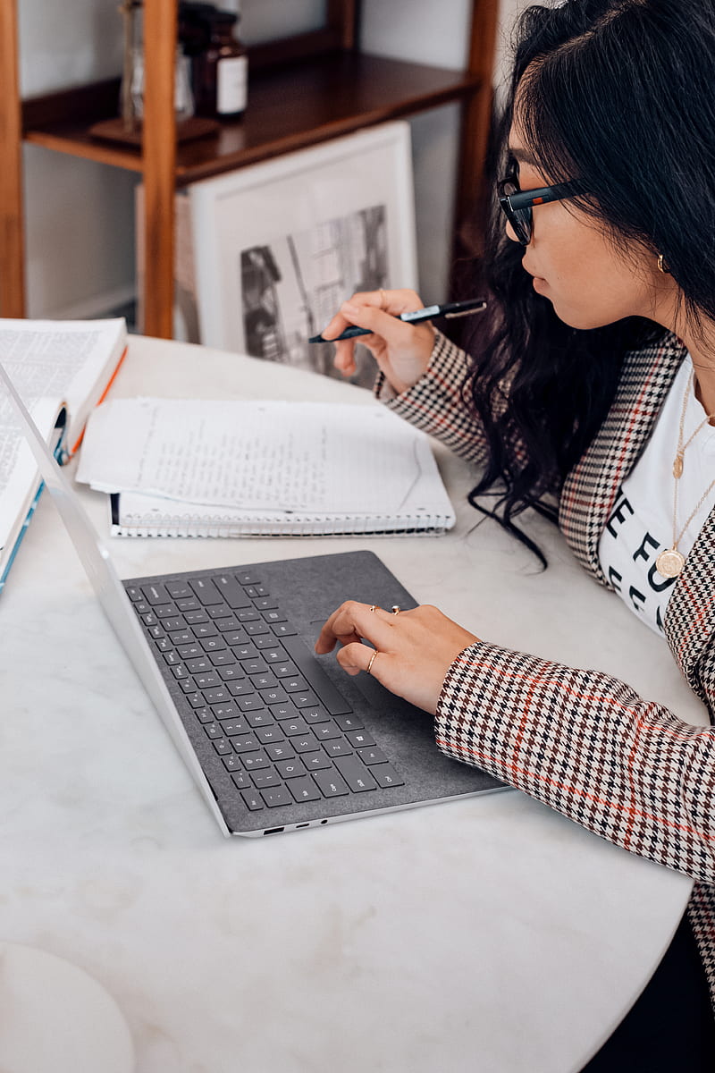woman in white and black plaid long sleeve shirt using black and silver laptop computer, HD phone wallpaper