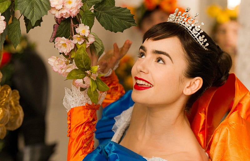 Lily Collins as Snow White, red lipstick, movie, orange, bloom, snow white, yellow, woman, green, actress, lily collins, beauty, pink, blue, mirror mirror, smile, spring, girl, crown, flower, princess, HD wallpaper