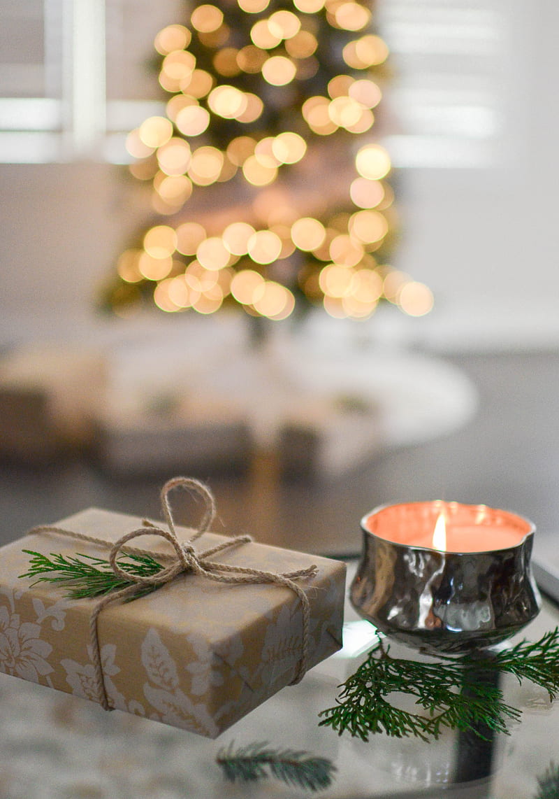 brown gift box beside stainless steel votive candle, HD phone wallpaper