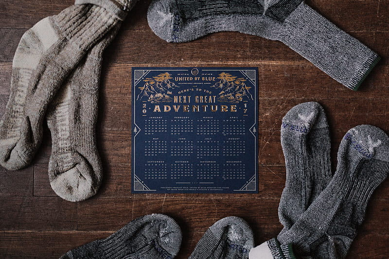 pair of gray socks and blue calendar on table, HD wallpaper