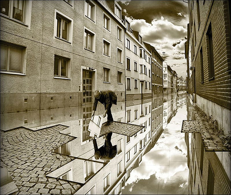 Solving a world puzzle!, world, clouds, graphy, reflection, street, buildings, solving, man, puzzle, sky, wall, solve, windows, monochromatic, HD wallpaper