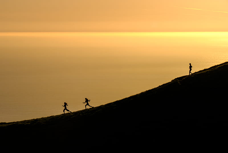 three persons running downhill during golden hour, HD wallpaper