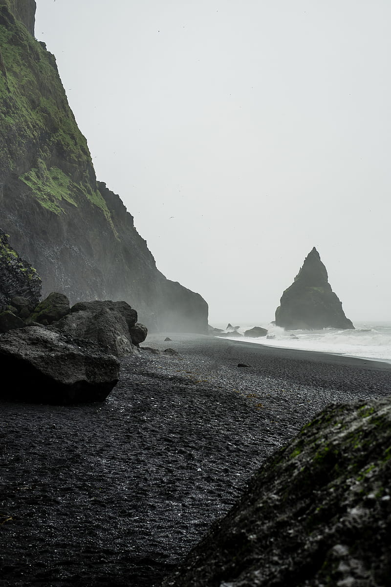 landscape of black rock formation on body of water near seashore, HD phone wallpaper