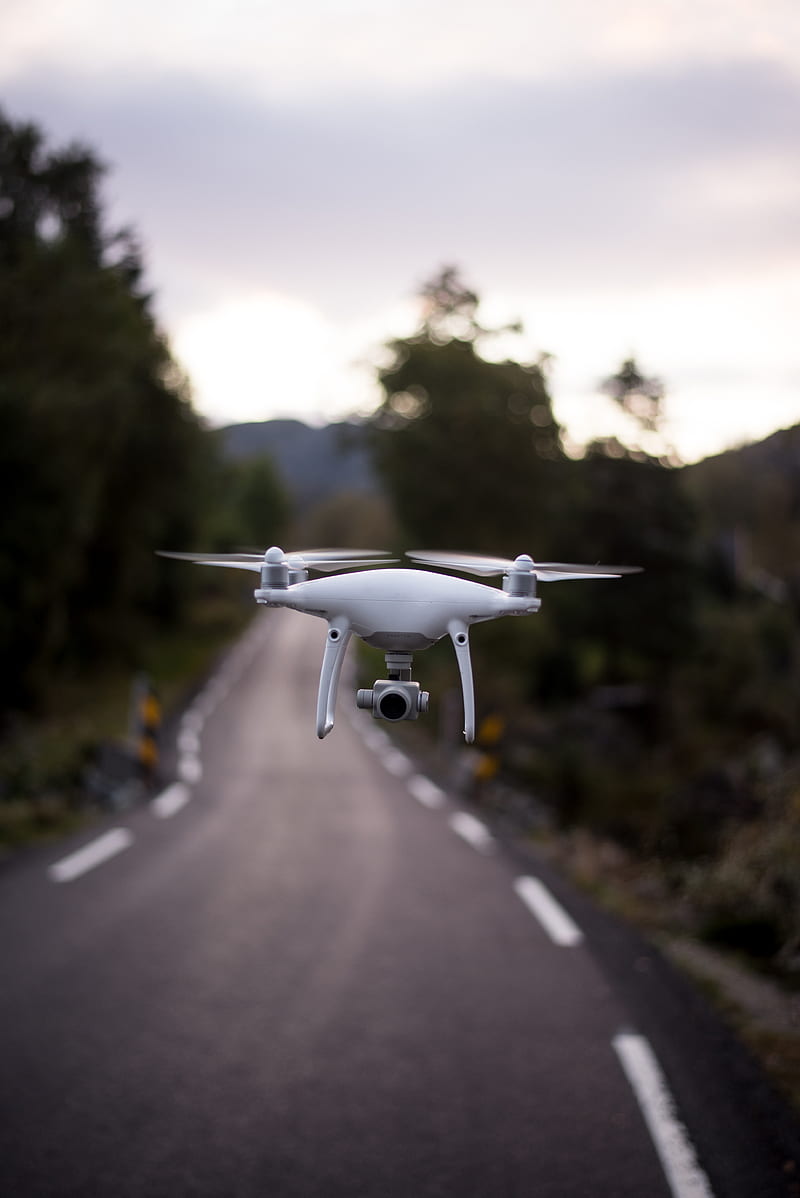 selective focus of quadcopter hang on air, HD phone wallpaper