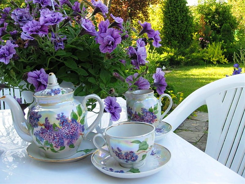 Garden table with flowers and tea, sunny, bonito, tea, outdoors, floral, teapot, still life, afternoon, green, flowers, relaxation, porcelain, table, quiet, model, terrace, purple, day, garden, nature, white, HD wallpaper
