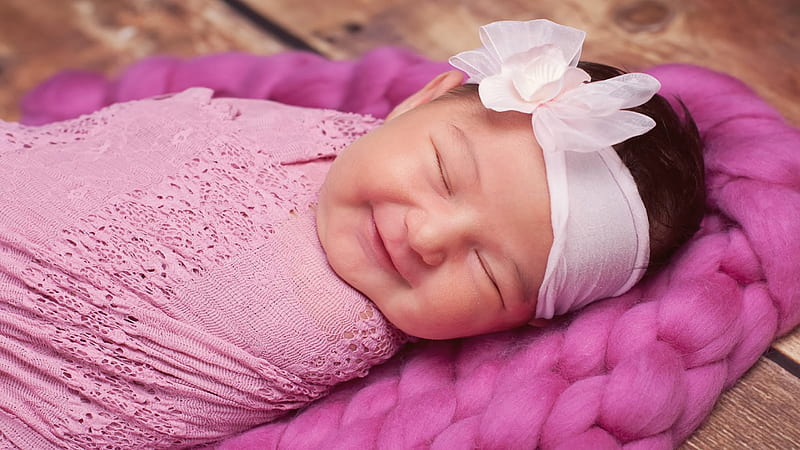 Smiley Cute Closed Eye Baby Is Covered With Pink Netted Towel And Having White Ribbon Band On Head Cute, HD wallpaper