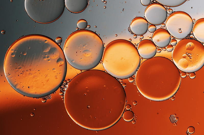 Oil drops in water, glass, water, oil, luminos, orange, texture, drops, skin, HD wallpaper
