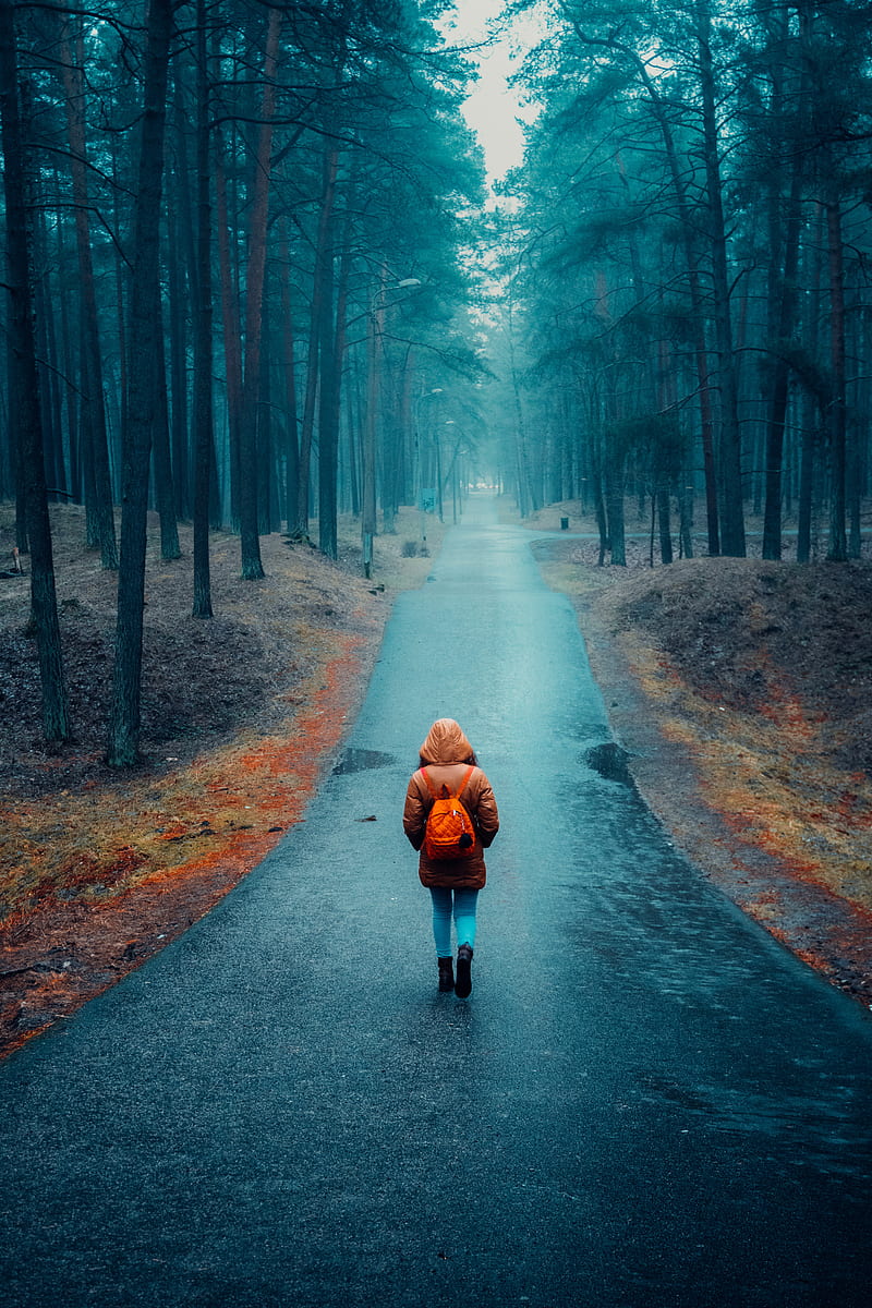 Girl Walking Alone On Road