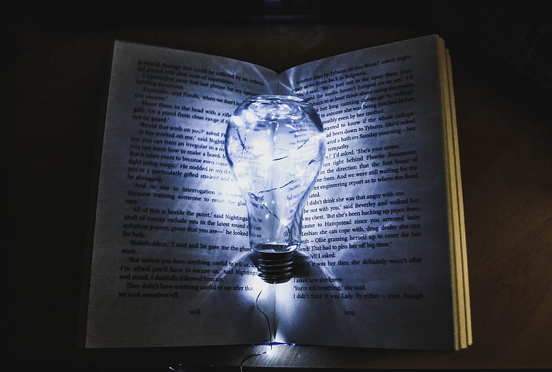 bulb with string lights on book page, HD wallpaper