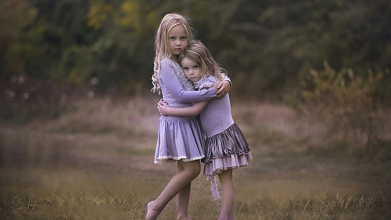 Cute Little Girls Are Hugging Each Other In Blur Trees Background Wearing Purple Dress Cute, HD wallpaper